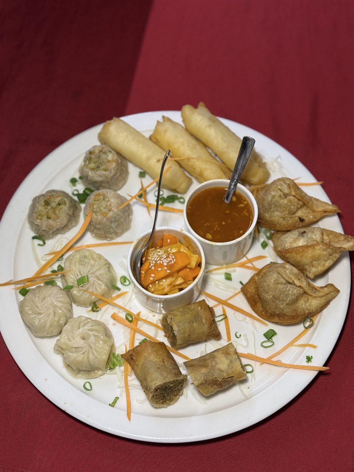 Starter platter — momos, spring rolls and wontons